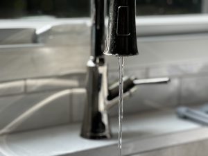 kitchen faucet with water running