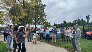 A group of people gather at a farm in Spring Green, Wisconsin