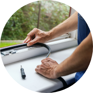 Applying weatherstripping to a drafty window