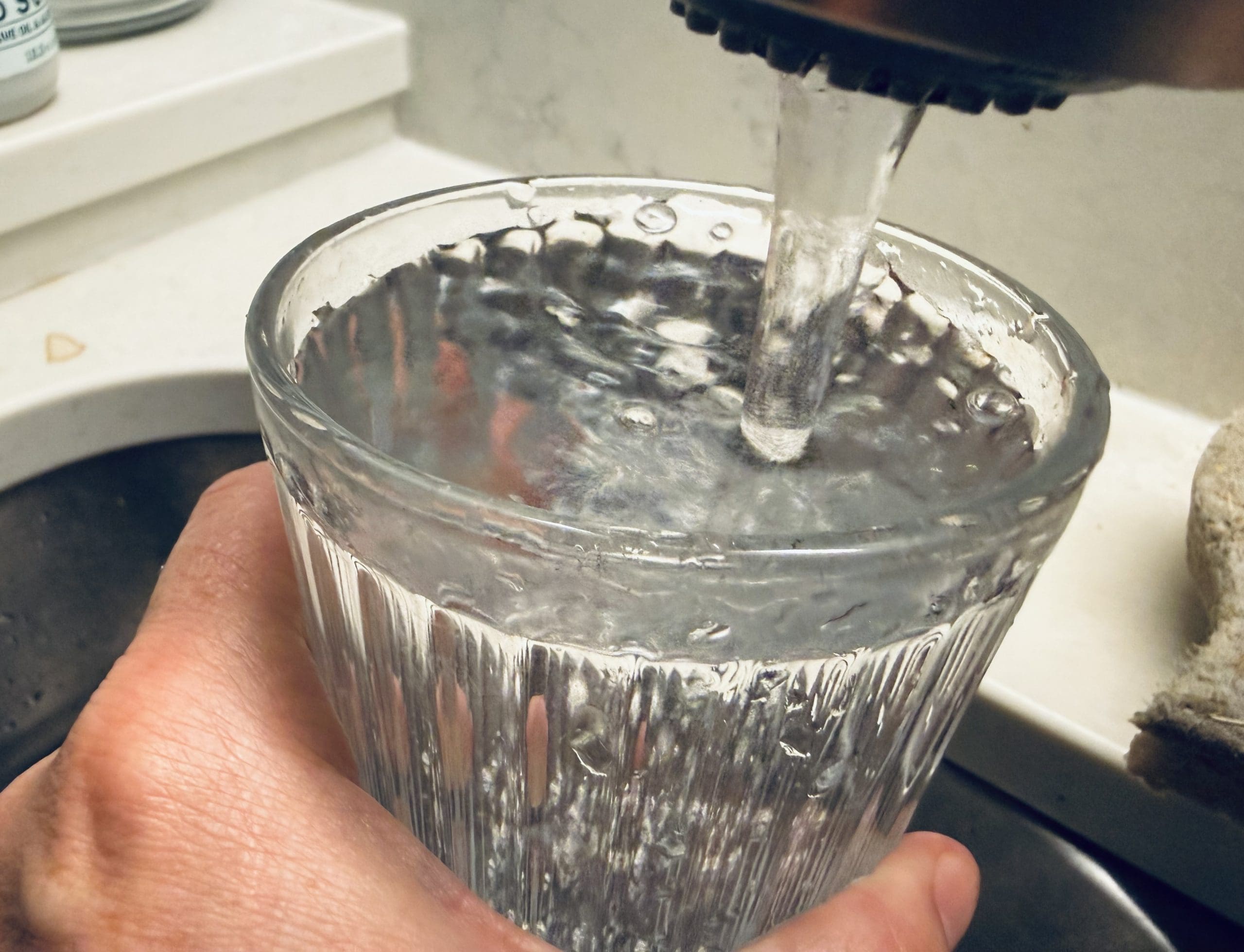 Photo Credit: Clean Wisconsin, filling a glass at the tap